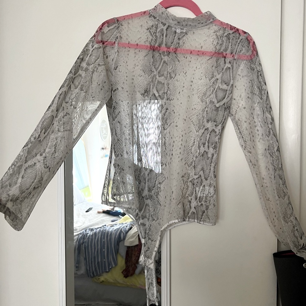 Sheer snakeskin body suit